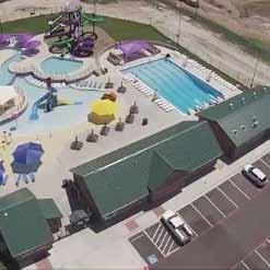 Since family aquatic center parking is only a 100-day seasonal use, sharing large parking lots with nearby ballfields and recreation centers is another way to save space and costs.