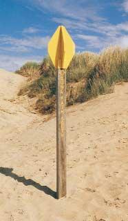 At the Sefton Coastal Path waymark you can continue ahead up and over the great sand dunes to reach the beach.