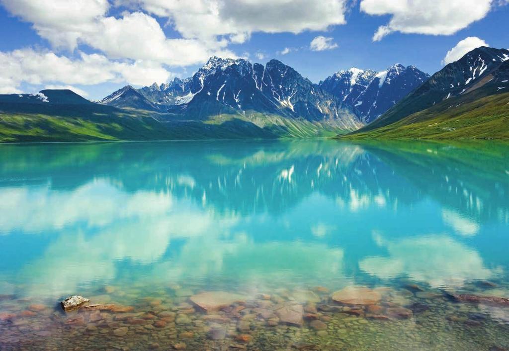 Clouds reflect off Turquoise Lake in Lake Clark National Park and Preserve.