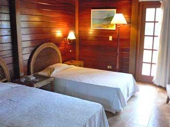 ACCOMMODATION BARACOA VILLA MAGUANA Next to the wild, white-sand beach of Maguana sit these four thatched rustic villas, comprising of 16 rooms.