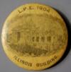 Lot # 216 - Celluloid Button with World's Fair Flag in the center. Above is "Louisiana Purchase Exposition.". Below is "1904 World's Fair St. Louis, U.S.A".