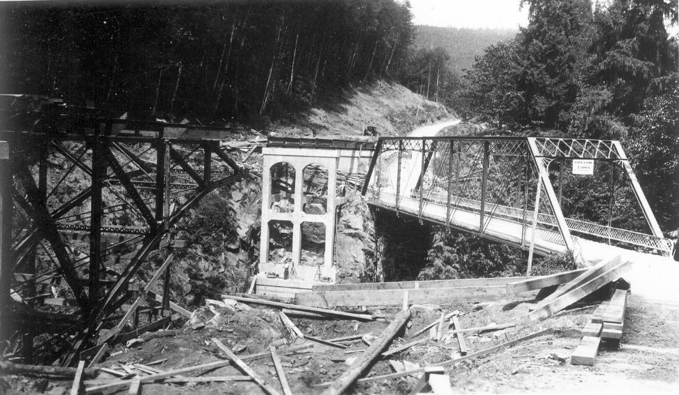 Bridge #102 (The Falls Bridge ) In Feb 1934, funding was approved to build a new bridge across the South Folk of the Stillaguamish River, near Granite Falls.