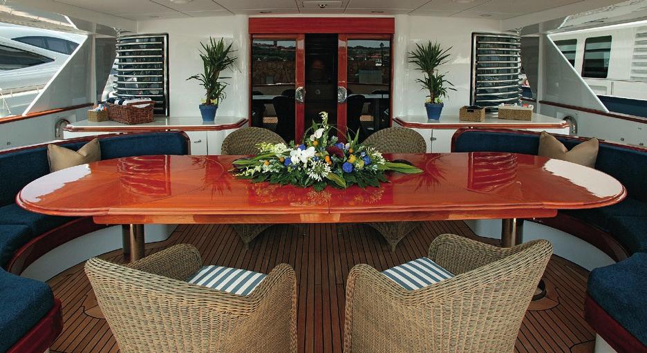 This light, spacious room features an artisan s hand-painted table that matches the limed oak and marble found elsewhere on the yacht.