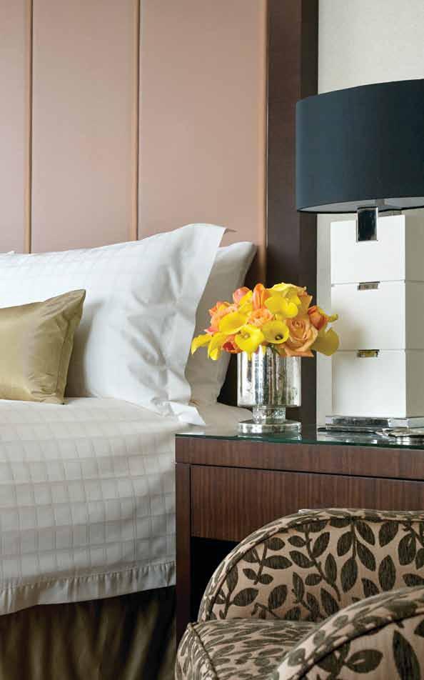 Relax into Four Seasons comfort sleek, contemporary and warmed by wood,