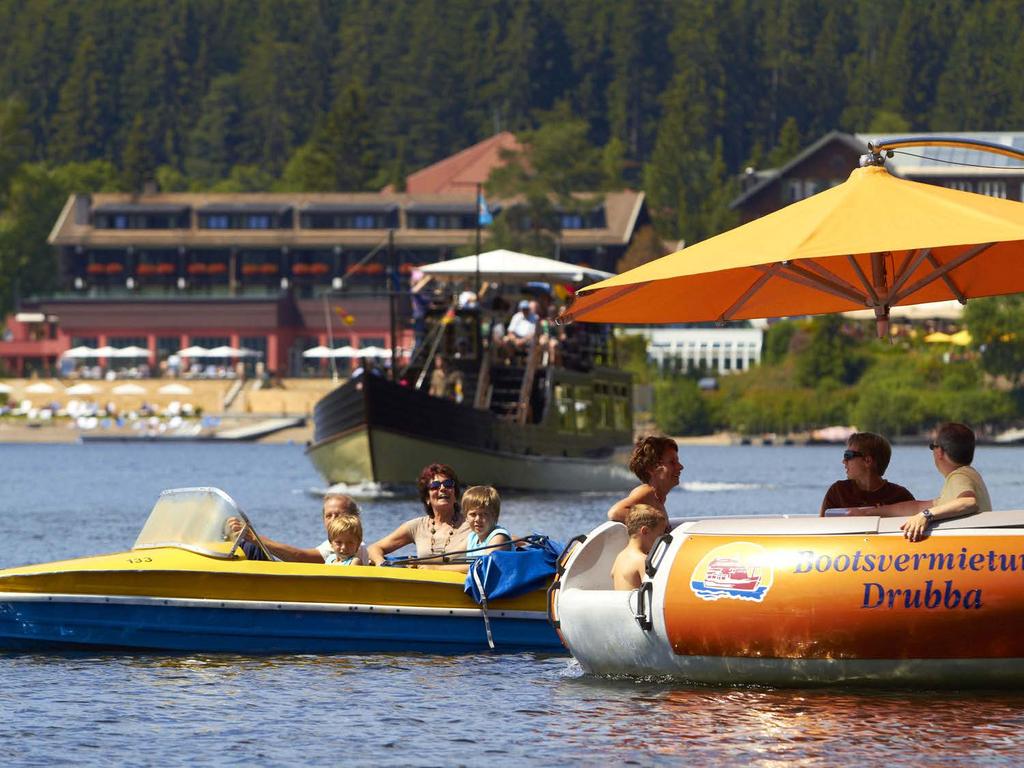 TITISEE BOAT-HIRE AND LAKE CRUISE Come and explore Titisee with various activities such sailing, windsurfing and paddling or even take a quick dip in the water.