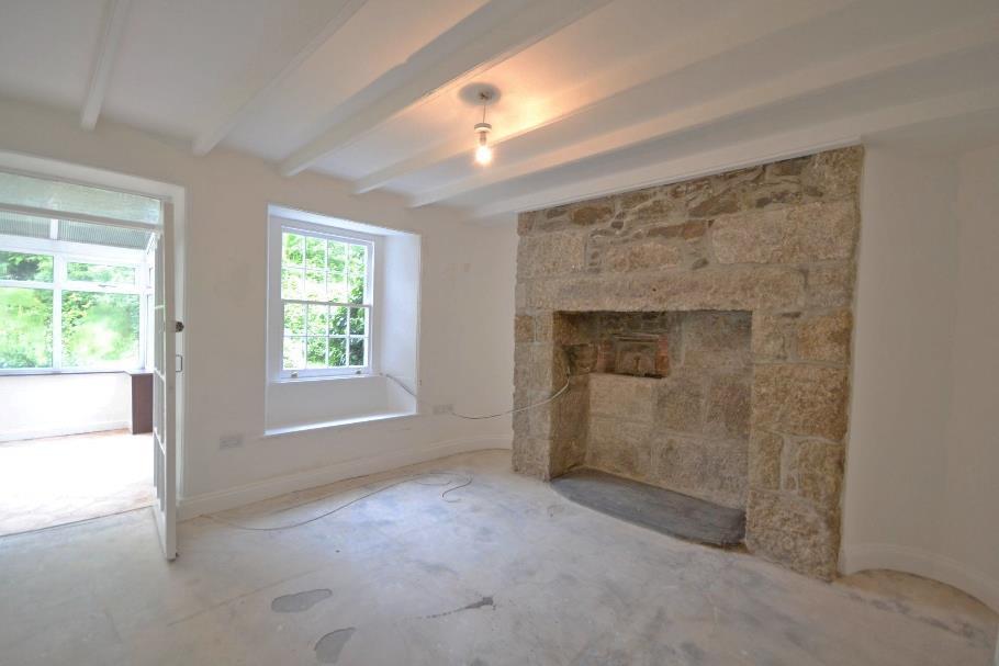 Door to:- DINING ROOM 13 x 11 7 to front of fireplace. High beamed ceiling, multi pane sash window with window seat overlooking the rear garden.