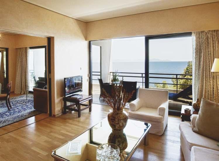 GRAND SUITE SEA VIEW -2BEDROOM This chic, urban, woody interior 80 square metre Grand Suite with panoramic views of the Mouse Island, the trademark of Corfu and the Ionian Sea makes for a most