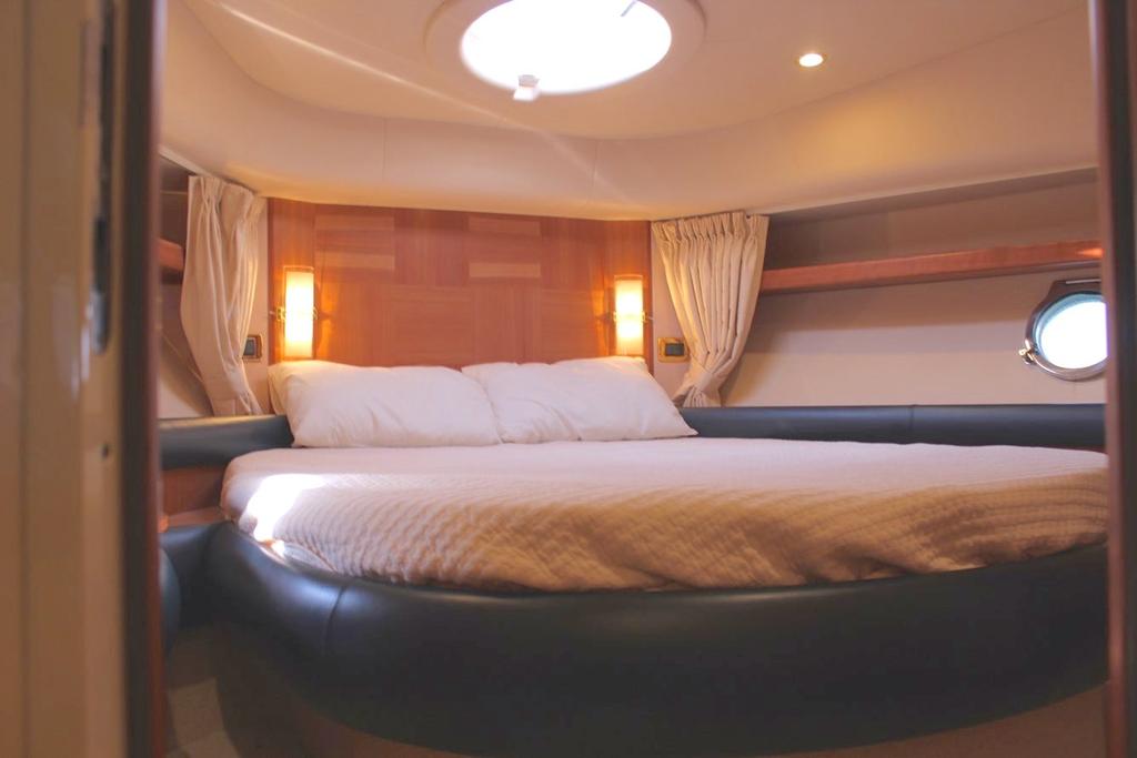The secondary VIP cabin, in the bow, shares a bathroom with the twin bedroom.