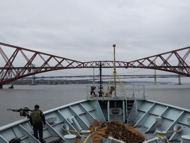 HMS SCOTT. For some of the junior Able Seaman HMs, this represented their first time at sea in the Navy. Left: The three Forth Bridges ahead of SCOTT. Right: Clearing the Queensferry Crossing.