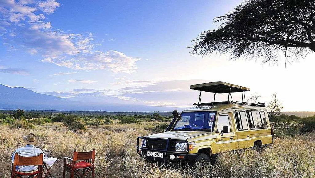Packed lunch Back to lodge Dinner and overnight stay at lodge Ngorongoro Game drive: Enjoy a game drive at Ngorongoro Crater - A deep, volcanic crater, the largest un ooded and unbroken caldera in