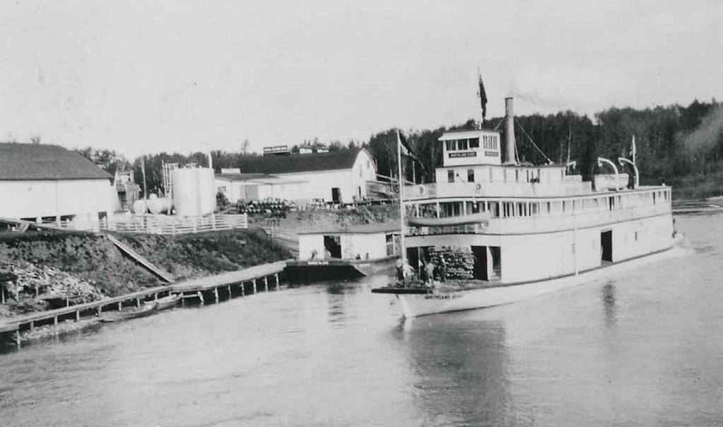 November 2012 Credit: Julian Mills, Fort McMurray Historical Society. WATERWAYS : 1925-1940. The S.S. Northland Echo docked in front the Imperial Oil Limited ramp in Waterways.