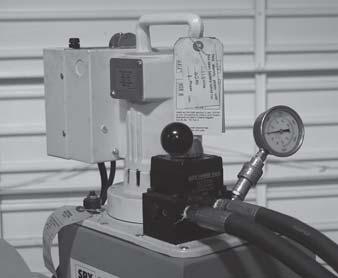 Operating Controls F-N-R (Forward-Neutral-Reverse) directional control lever. The F-N-R lever (shown in the neutral position) controls the direction of the ram cylinder.