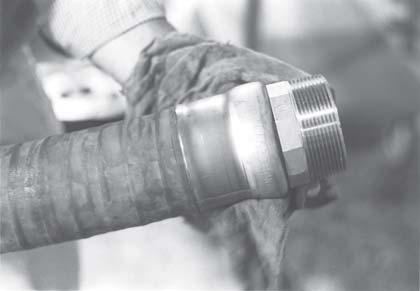 13 Wipe excess lubricant from hose and ferrule.