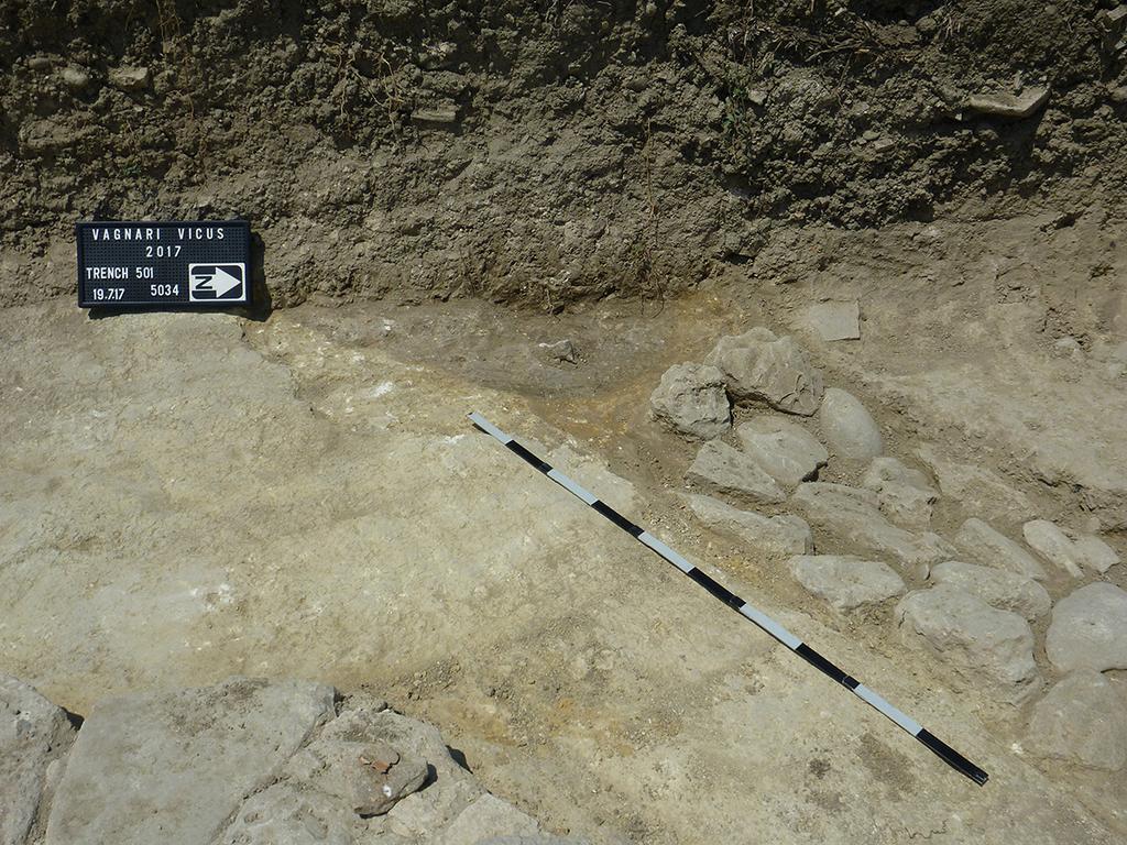 50) at the bottom of a storage pit. of these pits suggest that this first phase of the imperial vicus dates to the early 1st century A.D., very possibly the reign of Augustus (Fig. 3).