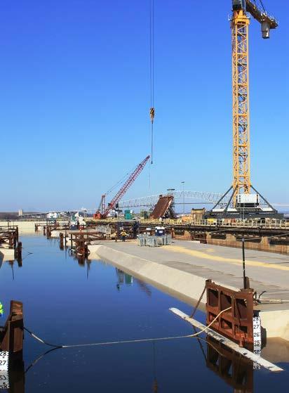 This process required use of a lay barge a large, specially-designed pontoonstyle boat to move each 16,000-ton element into position in the Elizabeth River and lower it to the prepared river bed.