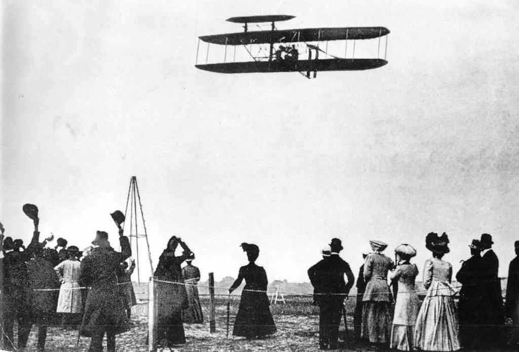STATION 4: MANNED FLIGHT The Wright brothers fly their Wright Flyer III airplane over Huffman Prairie, Ohio in 1904.