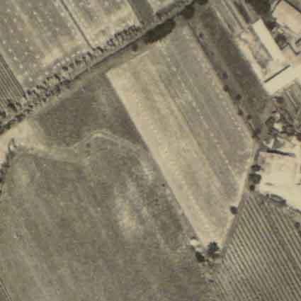 F-8 M.Buora Fig. 7. a) Fondo Comelli (aerial photo 1950 s). b) The same by Google Earth 2006.