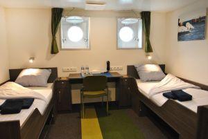 Twin Porthole, deck 4 2 portholes 2 lower berths Single cabin Price for the