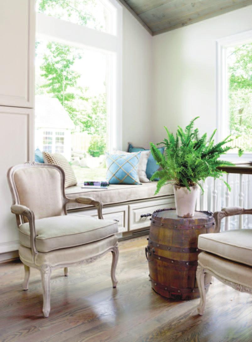 A pair of bergère chairs was a roadside find, which homeowner Jennifer Costanzo painted and reupholstered for extra seating.