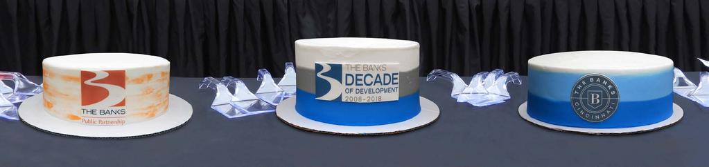 Three cakes from Midwest Culinary Institute celebrate (left to right) The Banks Public Partnership (infrastructure),
