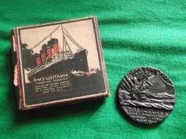 Lusitania Medal, a copy of one allegedly struck in Germany as a commemorative and its information sheet.