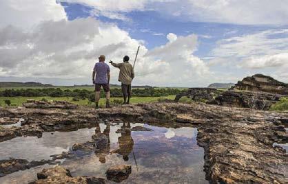 crocodile-spotting river cruises and excursions to ancient rock art galleries in Kakadu.