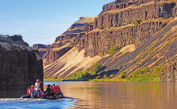 COLUMBIA & SNAKE RIVERS JOURNEY: HARVESTS, HISTORY & LANDSCAPES 7 DAYS/6 NIGHTS NATIONAL GEOGRAPHIC QUEST Guests enjoy a Zodiac ride on the Palouse River.