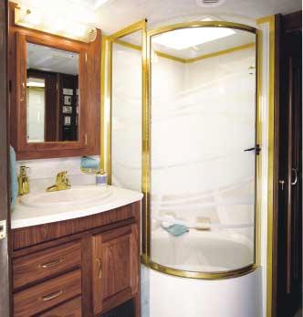 Islander s elegance is well represented in the galley, with hand-laid designer ceramic tile floors, color-coordinated genuine Corian countertops