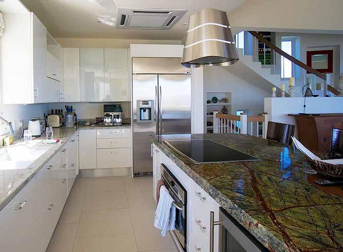 Kitchen with Style The villa has a modern, stylish and up to date kitchen with dishwasher and cooking facilities provided by electric