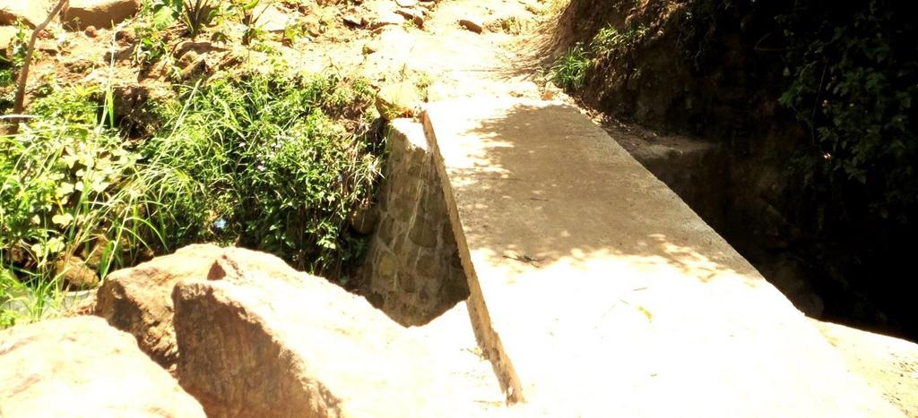 FOOT BRIDGES Since Nancholi is surrounded by three rivers, foot bridges were also a priority for the community.