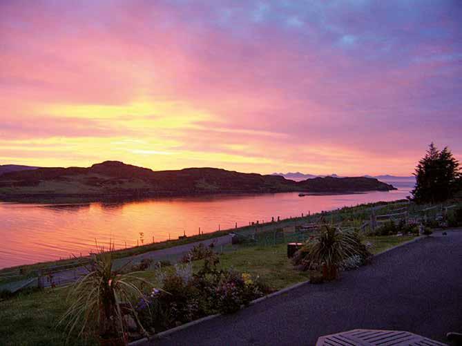 This location provides some exceptional sunsets over the Western Isles. The property sits within well-tended and productive garden grounds extending to around 2/3 of an acre.