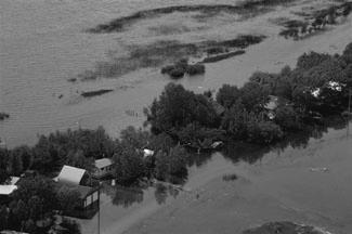 5. FLOODING AT BURGIS BEACH Page 5 of 5 These aerial views of Burgis