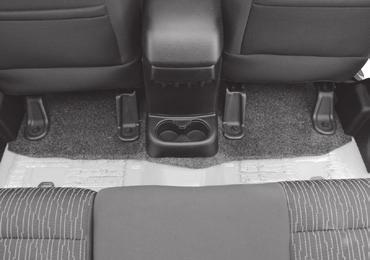 Adjust the front seats to the fully forward and tilted up (2-door passenger entry) position.