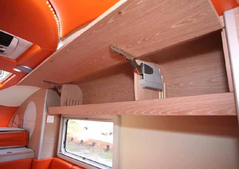 It has LED strip lighting around the outside, inset speakers and LED lights and makes a nice surround for both the roof mounted air conditioner and the hatch above the bed.