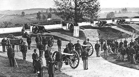 Fort Stevens photographed in August 1865 Smith, William Morris, photographer: Offi cers and men of Company F, 3d Massachusetts Heavy Artillery, in Fort Stevens.