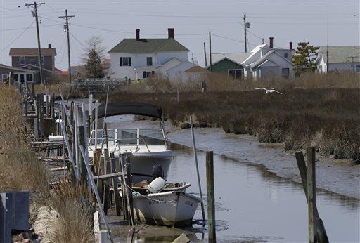 Research published in the journal Scientific Reports says residents of steadily shrinking Tangier Island will have to abandon their fishing community in approximately 50 years amid rising seas.