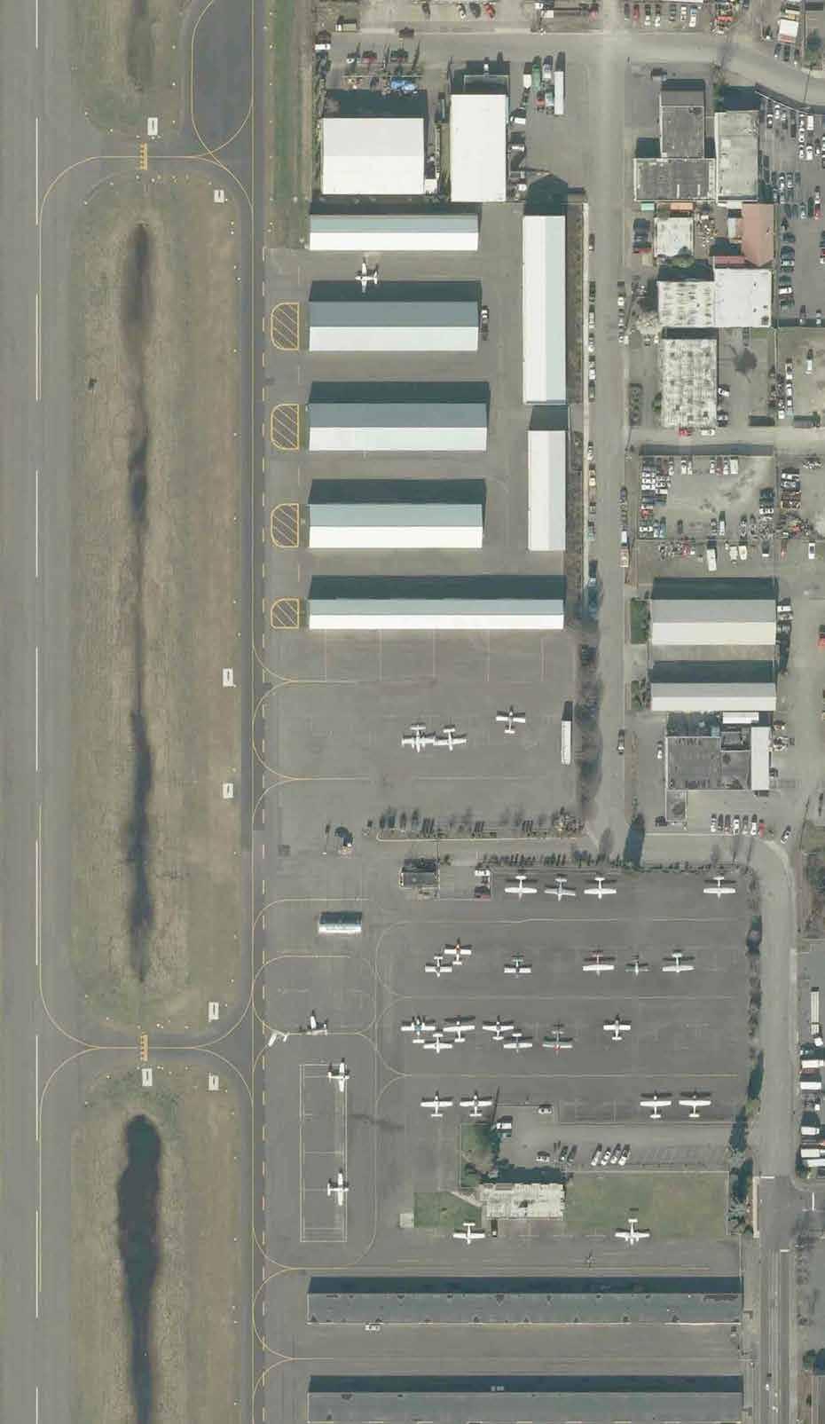 TAXILANE OFA (HANGARS) TAXILANE OFA (PARKED AC) TAXILANE OFA (PARKED VEHICLES) * NE E STREET TAXILANE (AC FUEL ISLAND) * TAXILANE/TAXIWAY OBJECT FREE AREA PARKED VEHICLES OBSERVED IN VARIOUS HANGAR