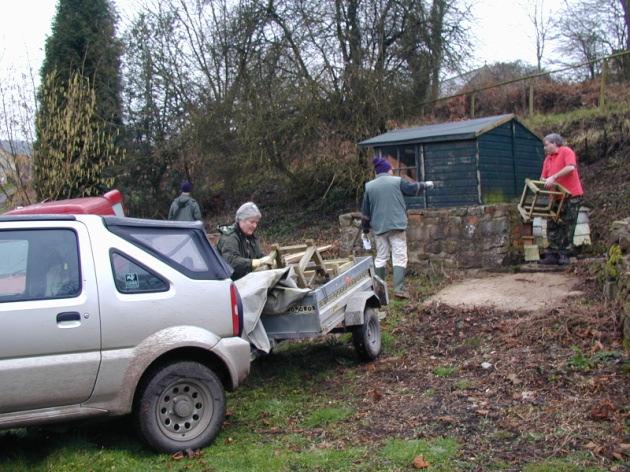 On two Saturdays in early February 2005 working parties were arranged, the first to take down the shed From Little Acorns and take it and the hives to Henry s where the hives were put onto pallets in