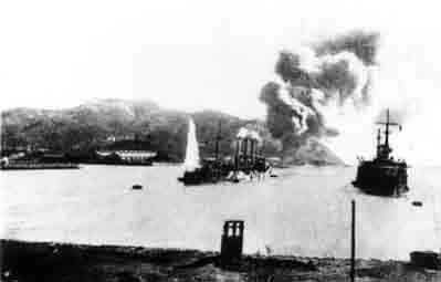 Russian battleships at Port Arthur bombarded by Japanese artillery. The cruiser Pallada in the foreground and the battleship Pobeda on its right. the battleships harboured there.