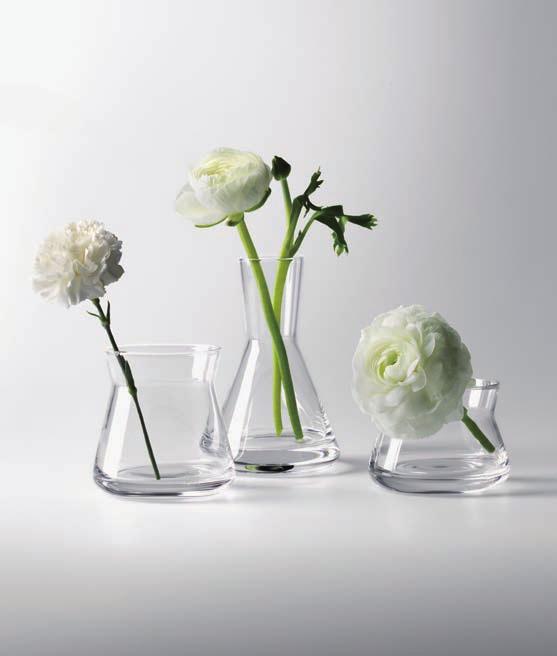 flowers. The vases can be spread across the table to enhance a beautiful table-setting.