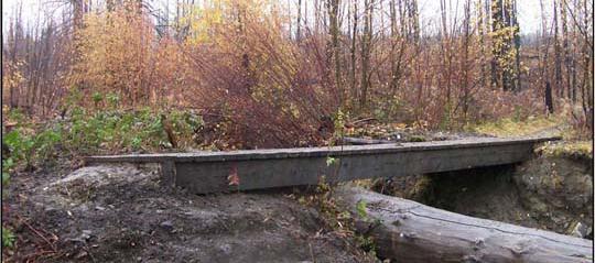 The Deeper Creek Bridge in Okanagan Mountain Provincial Park is not being repaired in 2012 as funding isn t available in the BC Parks budget.
