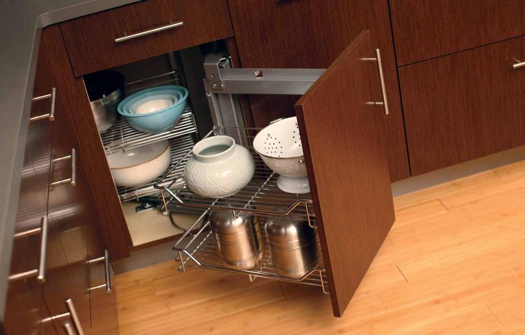 24 CONVENIENT CORNER STORAGE Corner cabinets encompass a surprising amount of space on the interior and Dura Supreme offers several ingenious accessories so that every inch of that space is