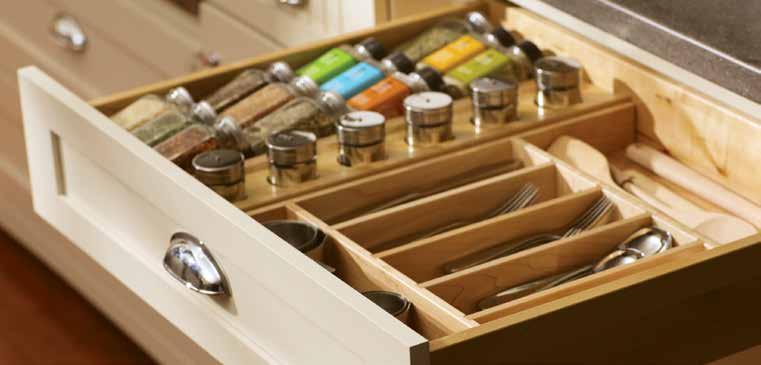 The end of an island is a great place to tuck a spice rack in a