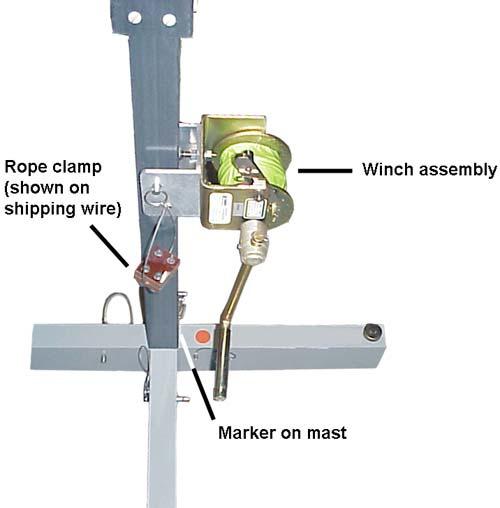 The rope clamp is located on a wire (as shown) for shipping purposes only. During step 6 of the assembly instructions you will move the rope clamp to the rope. 2.