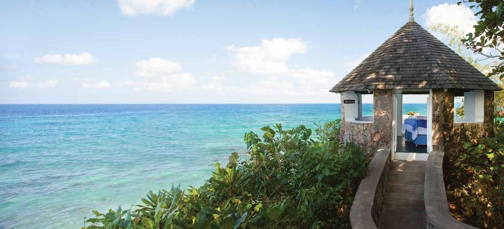 EXPLORE AN IDYLLIC RETREAT The Jewel of Jamaica, Couples Sans Souci is an intimate cliff-side oasis of secluded gardens and luxury suites, crisscrossed by stone paths and