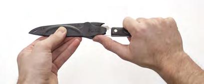 Figure 8 Figure 9 Step 2: Push with thumb on thumb pad (Figures 1 & 8) while CAREFULLY and SLOWLY pulling sheath off knife blade (Figure 9). ALWAYS keep eye contact during the sheath removal process.