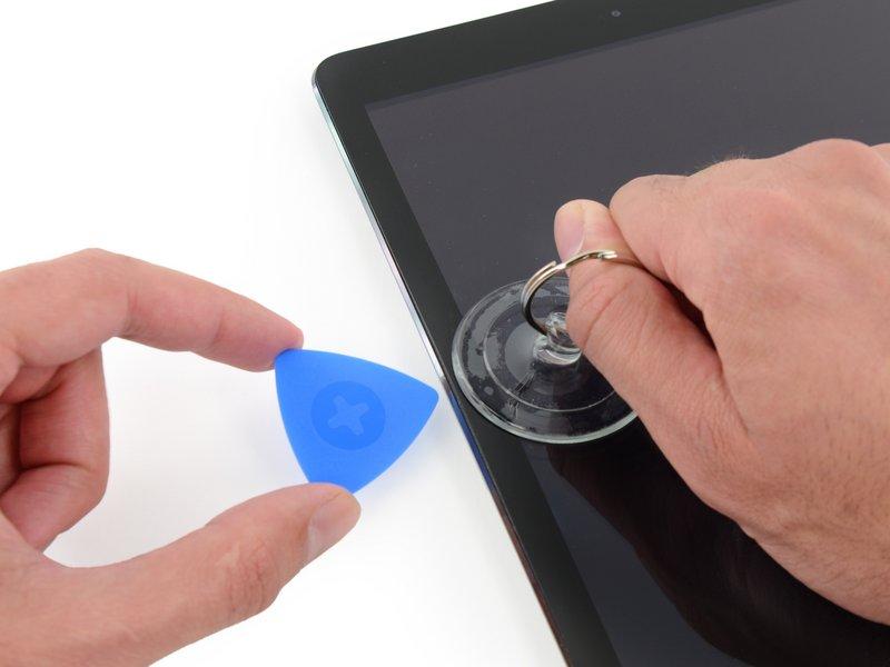 If your ipad's screen is badly cracked, covering it with a smooth layer of clear packing tape may help the