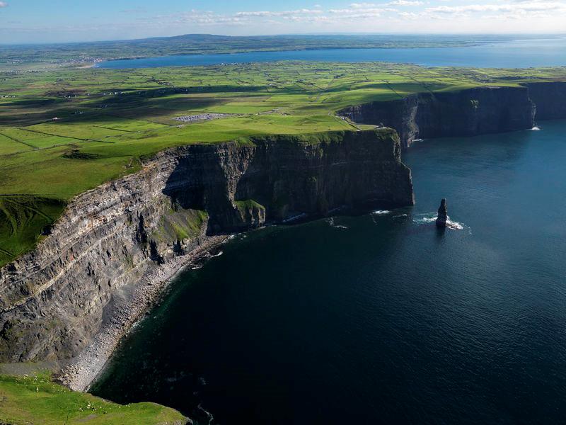 Fri, May-24 CLIFFS OF MOHER After a hearty Irish breakfast, drive along the coast of scenic County Clare and stop to visit the Cliffs of Moher, one of Ireland s most beloved, natural landmarks.
