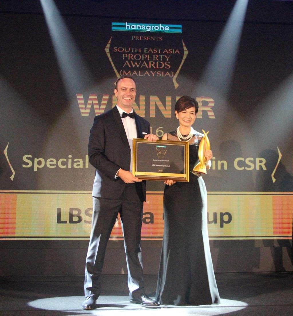 Photo 1: LBS Bina Group Berhad Executive Director, Dato Cynthia Lim (right) accepted the Special Recognition in Corporate Social Responsibility (CSR) Award and the Highly Commended Best Mid-Range