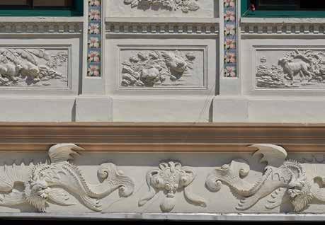 The Kwan Yow Luen shophouses feature extravagantly detailed plaster stucco figures. These include creatures such as dragons and phoenixes as well as auspicious animals such as bats.